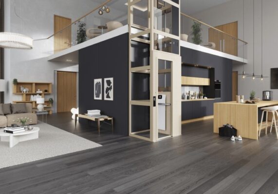 Home lift in light white color and transparent glass