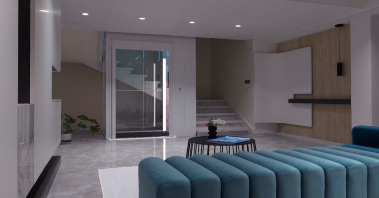 Desain lift rumah modern yang menyatu dengan interior minimalis menggunakan kaca, pencahayaan LED, dan material elegan di hunian Indonesia