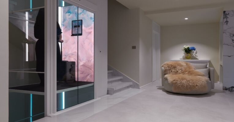Through floor home lift UK installed in a modern house for safe and easy two-floor access