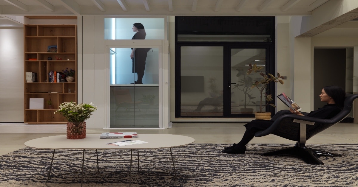 Vacuum elevator for Indian homes with transparent cylindrical cabin