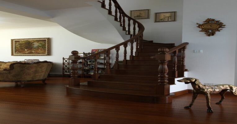 Narrow UK staircase with compact stairlift installed showing slim rail design and measurement guide for tight Victorian-style home stairs